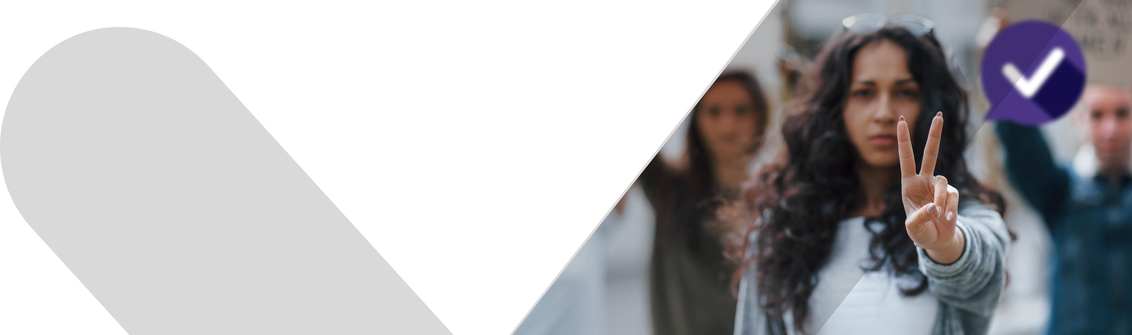 Woman making peace sign